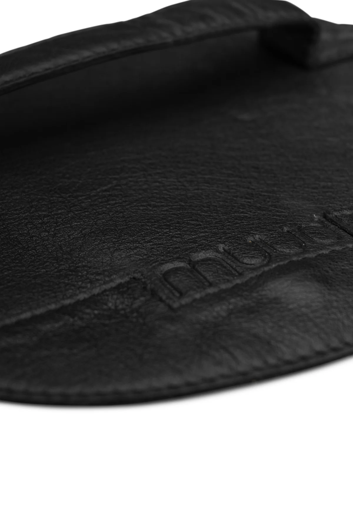 Svart lærdel i ekte skinn med sydd detalj fra Muud